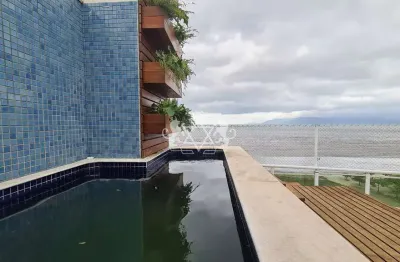 Cobertura duplex frente mar com piscina privativa e 3 vagas na garagem no bairro aruan em caraguata