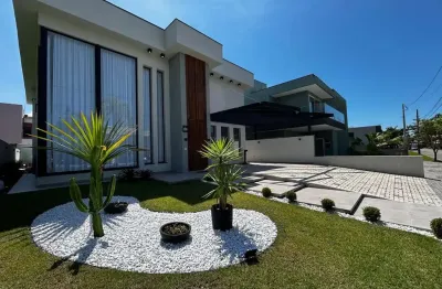 Sobrado a venda em condominio (alto padrao) com 4 suites/ area de lazer completa (churrasqueira, sauna e piscina) no bairro massaguacu, caraguatatuba, sp.