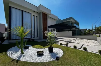 Sobrado a venda em condominio (alto padrao) com 4 suites/ area de lazer completa (churrasqueira, sauna e piscina) no bairro massaguacu, caraguatatuba, sp.