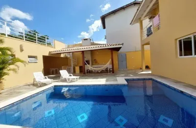 Lindo sobrado a venda, 04 dormitorios, sendo 01 suite, piscina, na quadra da praia, jardim primavera, proximo ao centro, caraguatatuba sp