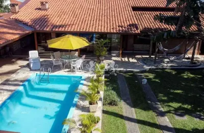 Casa  com 4 dormitorios, 2 suites, piscina, uma quadra da praia a venda, praia das palmeiras, caraguatatuba, sp