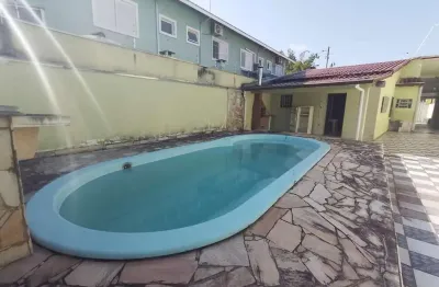 Casa com otima localizacao martin de sa com 4 dormitorios, 3 suites, edicula, piscina e 6 vagas de garagem