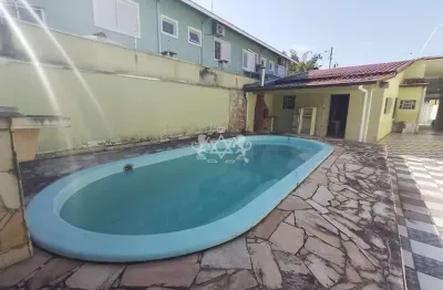 Casa com otima localizacao martin de sa com 4 dormitorios, 3 suites, edicula, piscina e 6 vagas de garagem