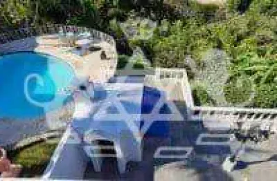 Casa em condomínio fechado com 4 quartos à venda na Praia da Cocanha, Caraguatatuba 