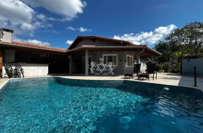 Casa a venda, 'mobiliado' com 452m2 at i ac 282m2, 4 suites, area de lazer completa com churrasqueira e piscina verde ii, caraguatatuba, sp