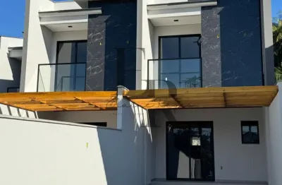 Geminado à venda com 116 m² - 1 suíte, 2 quartos, área gourmet e arquitetura moderna