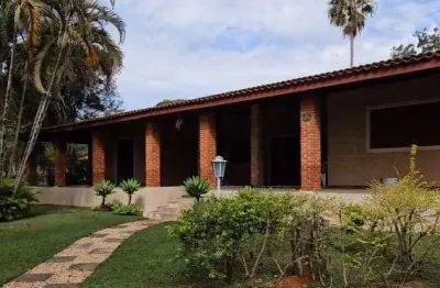 Estuda permuta chácara em condomínio com terreno 1.500 m² e 500 m² construídos