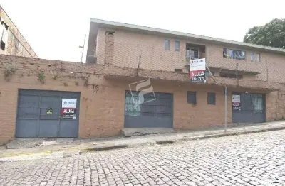 Loja térrea com área privativa: 100,00m², banheiro social., divisórias