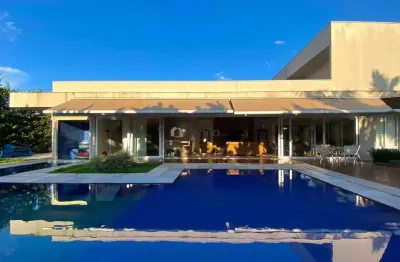 Casa a venda com quatro suites no condominio damha 1