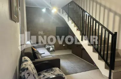 Terreno de 177m² com duas residências, garagem para 5 veículos, terraço e depósito