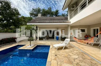 Sobrado de alto padrão à venda no condomínio ibirapitanga - 5 suítes, piscina e espaço gourmet
