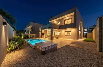 Casa com 4 dormitórios à venda, 310 m² por R$ 4.000.000,00 - Condomínio Residencial Alphaville - São José dos Campos/SP