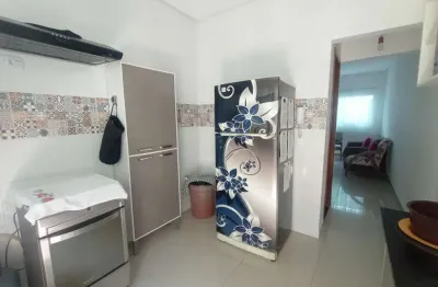 Lindo sobrado de condomínio a 250 metros do mar à venda no bairro maracanã em praia grande