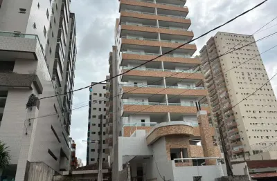 Apartamento à venda na guilhermina em praia grande-sp: 2 dormitórios, 1 suíte, 2 salas, 2 banheiros, 1 sacada gourmet,  1 vaga - 76m². venha conferir!