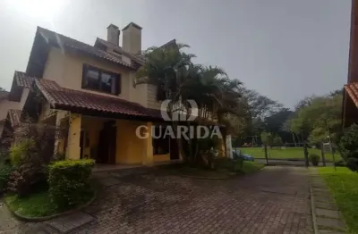 Casa em condomínio fechado com 3 quartos à venda na rua luís felipe monmany, 101, espírito santo, porto alegre por r$ 565.000
