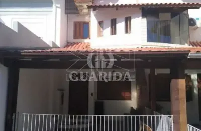 Casa em condomínio fechado com 3 quartos à venda na avenida juca batista, 1458, ipanema, porto alegre por r$ 550.000