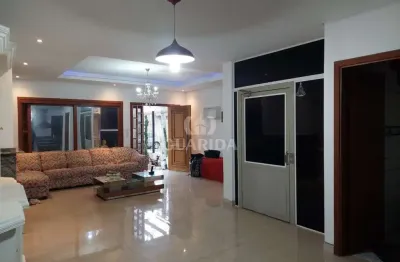 Casa com 3 quartos à venda na rua felipe arísio, 31, hípica, porto alegre por r$ 470.000
