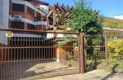 Casa com 4 quartos à venda na rua canto e melo, 64, nonoai, porto alegre por r$ 1.490.000