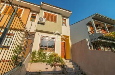 Casa com 3 quartos à venda na rua ilari arlindo basei, 62, guarujá, porto alegre por r$ 490.000