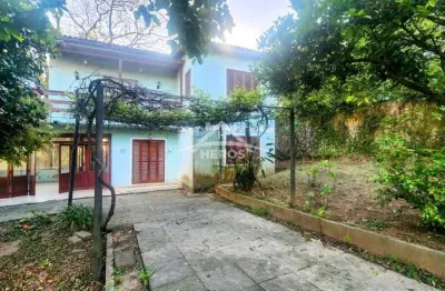 Casa com 4 quartos à venda na rua monte claro, 74, hípica, porto alegre por r$ 470.000