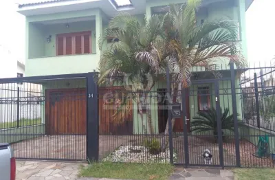Casa com 3 quartos à venda na rua louro, 34, hípica, porto alegre por r$ 745.000