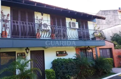 Casa em condomínio fechado com 3 quartos à venda na avenida juca batista, 1490, ipanema, porto alegre por r$ 520.000