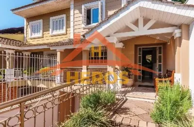 Casa com 4 quartos à venda na avenida arlindo pasqualini, 363, ipanema, porto alegre por r$ 1.275.000