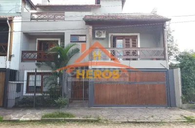 Casa com 3 quartos à venda na rua engenheiro tito marques fernandes, 40, ipanema, porto alegre por r$ 985.000