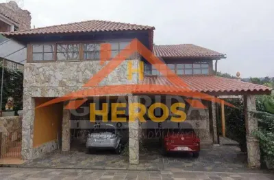 Casa com 4 quartos à venda na rua flor de pessegueiro, 27, vila nova, porto alegre por r$ 500.000