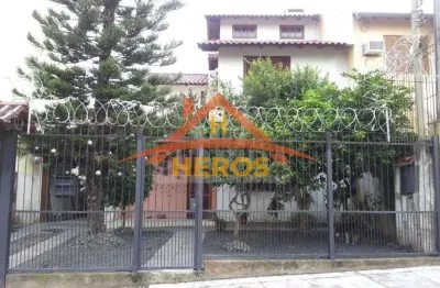 Casa com 3 quartos à venda na rua jerolomo minuzo, 296, vila nova, porto alegre por r$ 500.000
