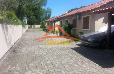 Casa em condomínio fechado com 2 quartos à venda na rua das espatódeas, 340, ponta grossa, porto alegre por r$ 180.000