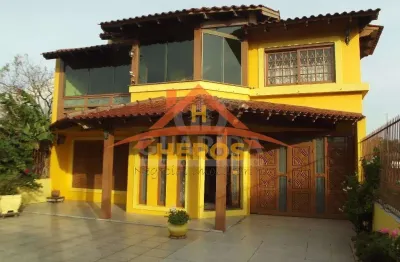 Casa com 4 quartos à venda na rua marquês do maricá, 505, vila nova, porto alegre por r$ 795.000