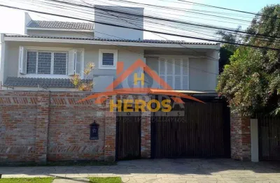 Casa com 6 quartos à venda na rua arapei, 228, cristal, porto alegre por r$ 1.200.000