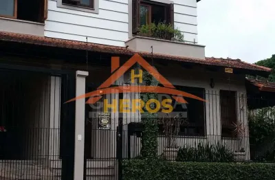 Casa com 3 quartos à venda na rua olegário mariano, 30, espírito santo, porto alegre por r$ 650.000