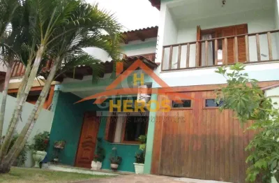 Casa com 3 quartos à venda na rua márcio dias, 176, nonoai, porto alegre por r$ 700.000