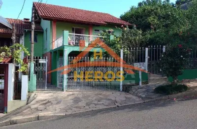 Casa com 2 quartos à venda na rua ângelo passuelo, 100, vila nova, porto alegre por r$ 460.000