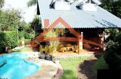 Casa com 3 quartos à venda na rua pedro de oliveira frança, 572, chapéu do sol, porto alegre por r$ 990.000
