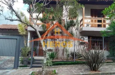 Casa com 3 quartos à venda na rua olécio cavedini, 255, espírito santo, porto alegre por r$ 1.100.000