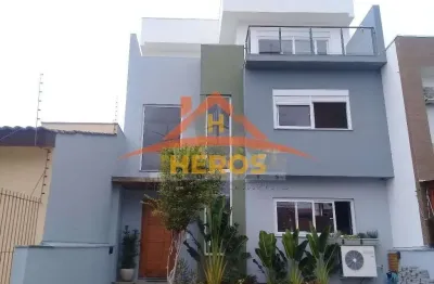 Casa com 3 quartos à venda na rua nestor josé nitschke, 240, guarujá, porto alegre por r$ 795.000