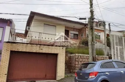 Casa com 3 quartos à venda na rua doutor lucidoro brito, 135, medianeira, porto alegre por r$ 396.000