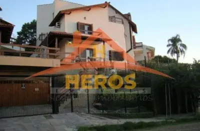 Casa com 4 quartos à venda na rua arachanes, 183, espírito santo, porto alegre por r$ 1.100.000