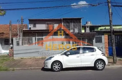 Casa com 3 quartos à venda na avenida macedônia, 826, restinga, porto alegre por r$ 330.000