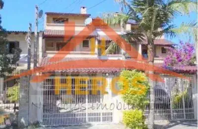 Casa com 3 quartos à venda na rua dário cardoso, 40, espírito santo, porto alegre por r$ 660.000