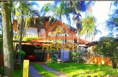 Casa com 3 quartos à venda na estrada joão vedana, 561, cavalhada, porto alegre por r$ 905.000