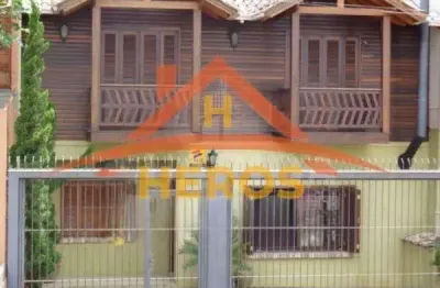Casa com 5 quartos à venda na rua mata coelho, 98, nonoai, porto alegre por r$ 650.000
