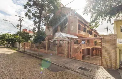 Casa em condomínio fechado com 3 quartos à venda na rua padre joão batista reus, 1040, vila conceição, porto alegre por r$ 920.000