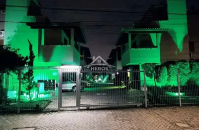 Casa em condomínio fechado com 2 quartos à venda na avenida guarujá, 126, guarujá, porto alegre por r$ 430.000