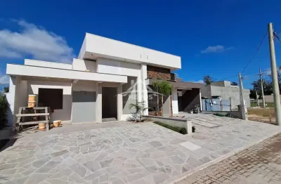Casa em condomínio fechado com 3 quartos à venda na avenida juca batista, 5505, hípica, porto alegre por r$ 699.000