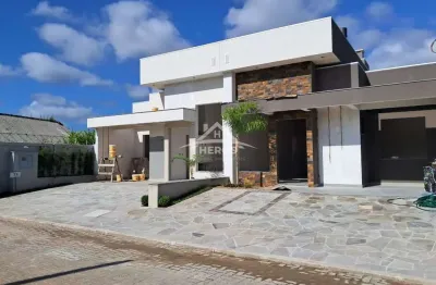 Casa em condomínio fechado com 3 quartos à venda na avenida juca batista, 5505, hípica, porto alegre por r$ 699.000