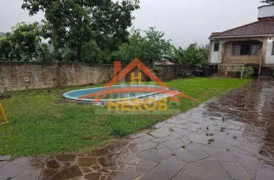 Casa com 3 quartos à venda na rua marquês do maricá, 168, vila nova, porto alegre por r$ 599.900